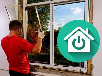 An icon of a home in a green circle and a man carefully installing a new weather-tight window.